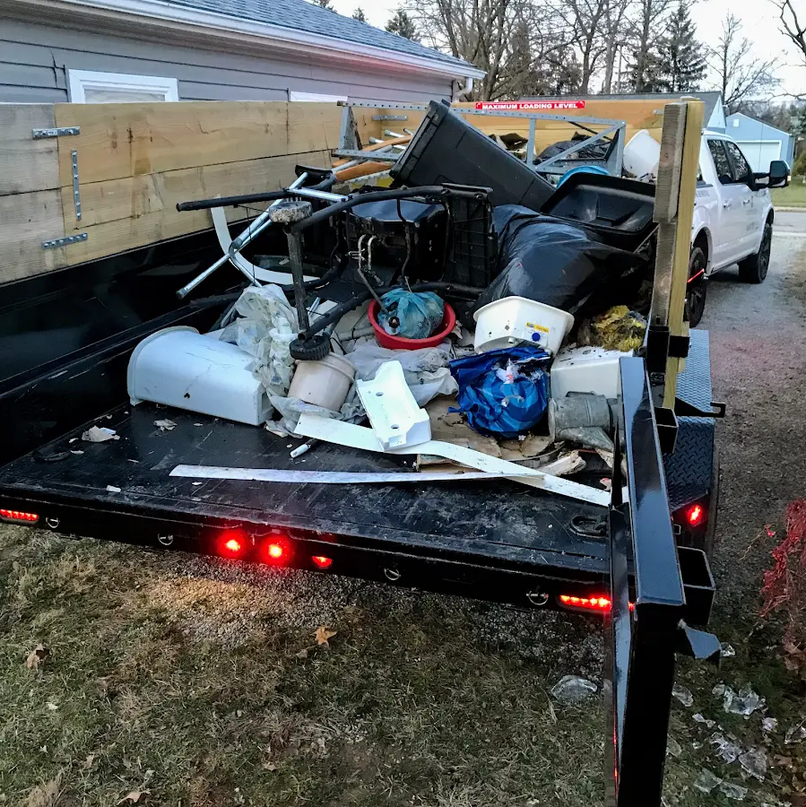 Roll-off dumpster delivered to a residential driveway in Lyon
